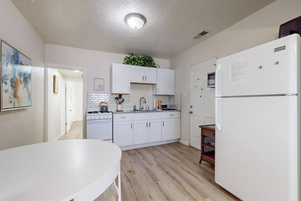 Kitchen space is shared with dining area