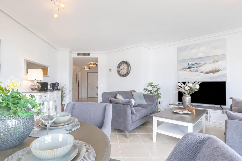 Family Apartment, 2 Bedrooms, 2 Bathrooms, Mountainside (Sunset Golf Elegance) | Living area | Flat-screen TV