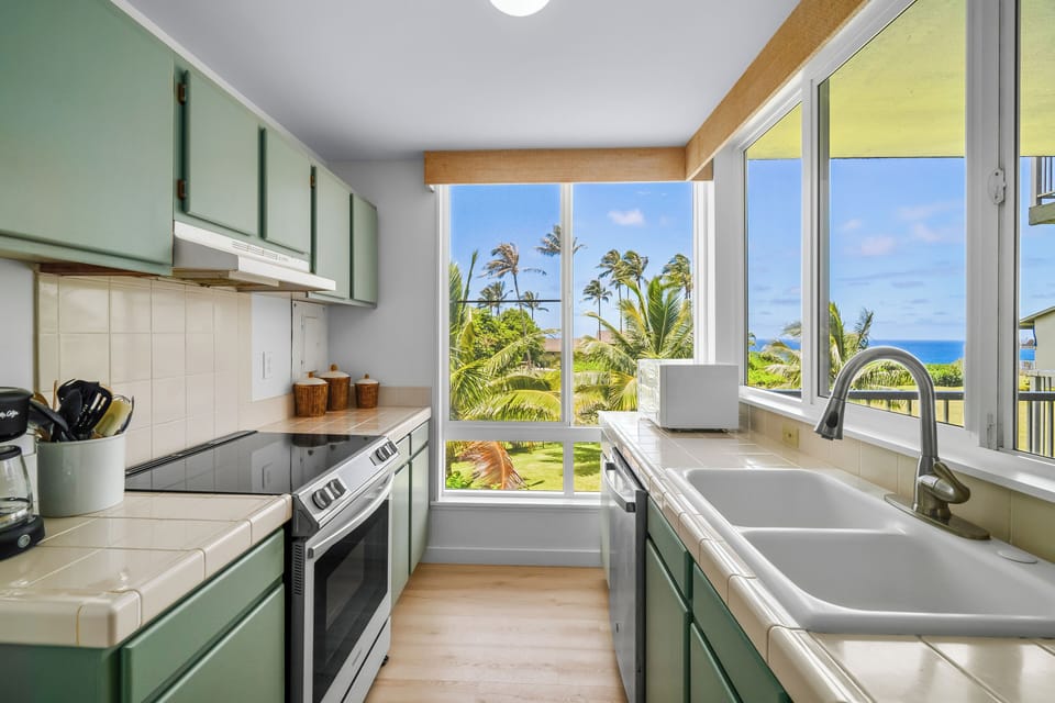 Embrace the laid-back island lifestyle in our charming kitchen, designed with tropical flair and modern convenience.
