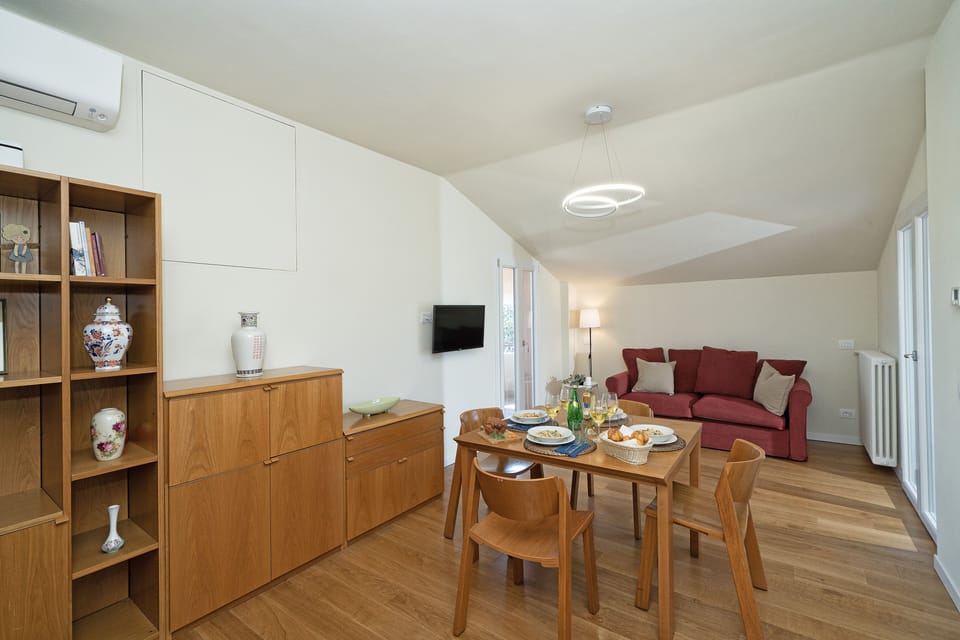 Apartment | Living area | 30-inch flat-screen TV with digital channels