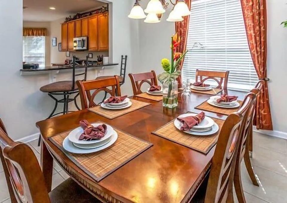 Spacious dining area perfect for family meals or gatherings with friends.