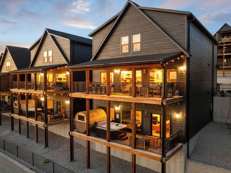 Welcome to LUX GOLF LODGE where you can enjoy the hot tub, sauna, outdoor dining, and sunset lake views.

