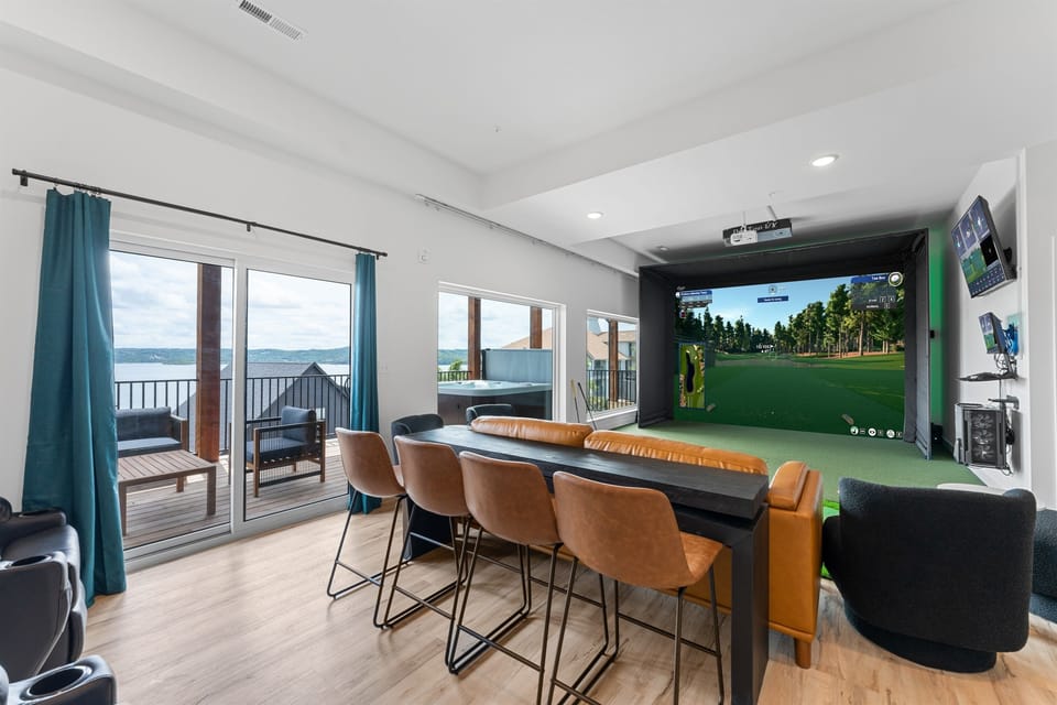 Host your own mini tournament with the in-home golf simulator—fun competition any time, rain or shine.