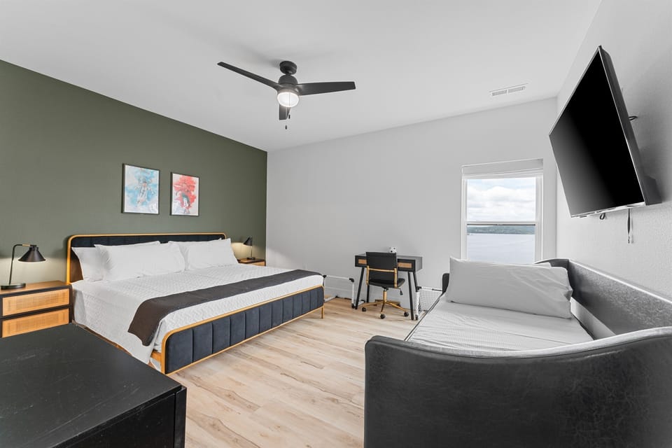 The Soccer GOAT Room includes a king bed, twin trundles, and a dedicated workspace for added versatility.
