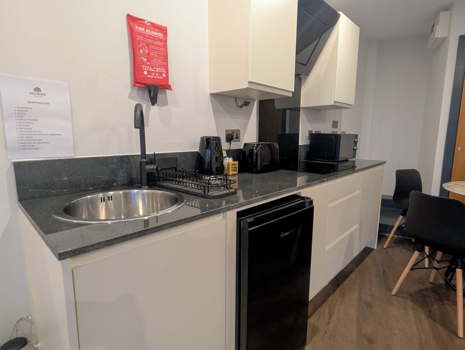 Standard Apartment, 1 Double Bed, Non Smoking (Walk-in Shower;with Sofabed) | Private kitchen | Electric kettle, dining tables