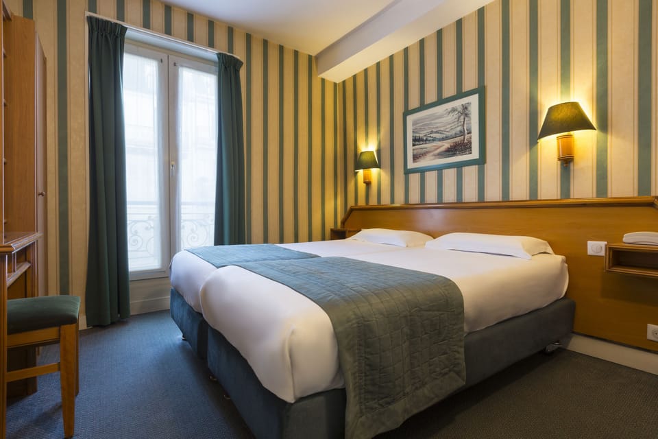 Twin Room, 2 Twin Beds, Non Smoking, Private Bathroom | In-room safe, desk, iron/ironing board, free WiFi