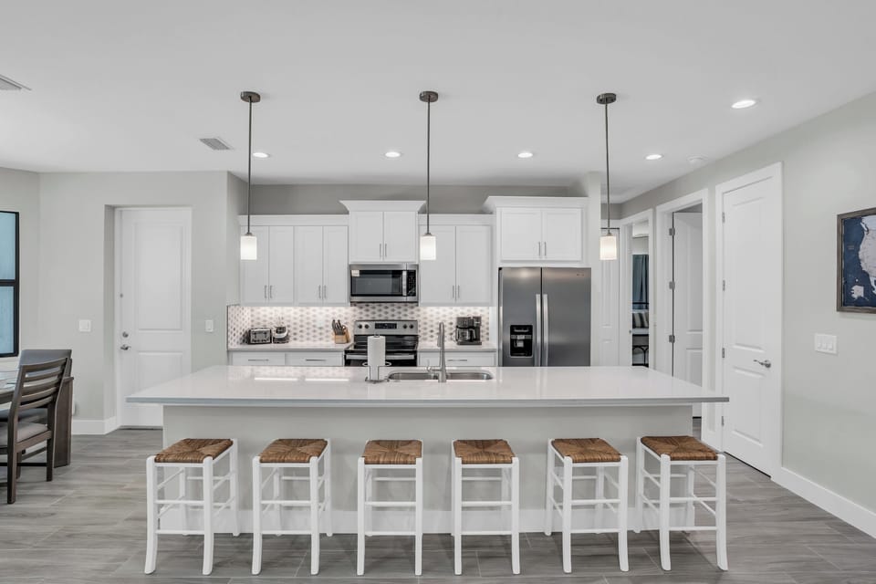 Kitchen with 6 at the bar & 6 at the table.