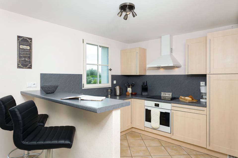 Prepare meals in the kitchenette with everything you need to cook in the comforts of your villa.