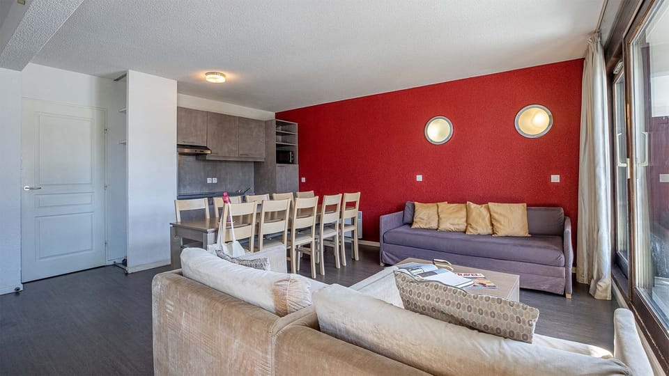 Sink into the cozy sofa after a day exploring the area.