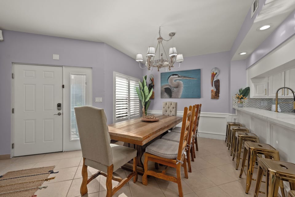 Dining Table comfortably sits up to 8 guests with extra seating at the kitchen bar!