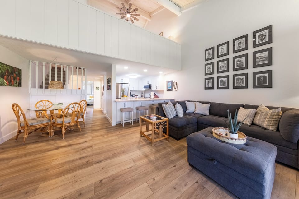 An open-concept layout with a soaring cathedral ceiling and plenty of seating.