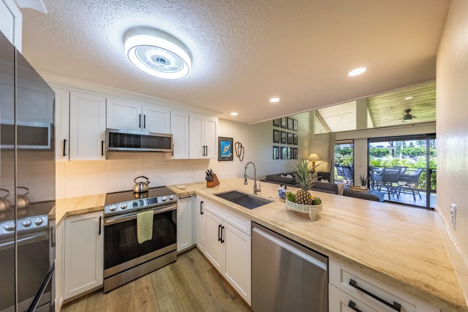 The kitchen is fully stocked with all the essentials for preparing meals.