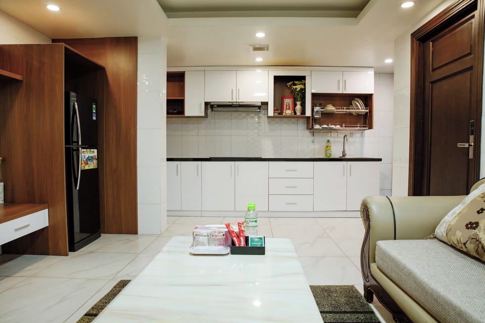 City Studio Suite, No Windows | Living area | 1-inch flat-screen TV with cable channels