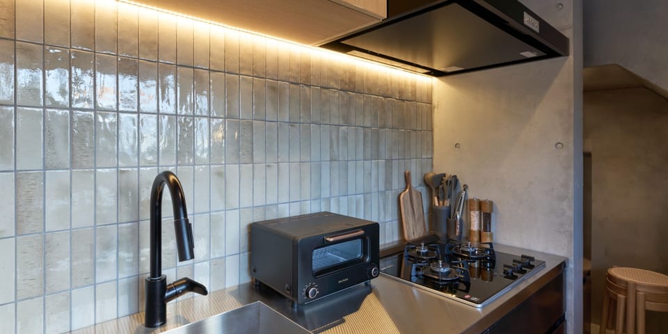 Full-size fridge, microwave, stovetop, rice cooker