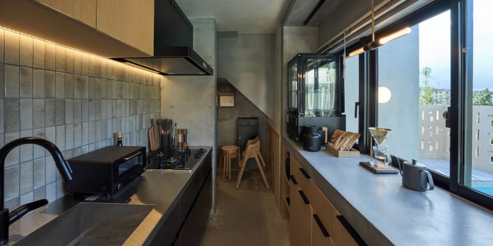 Full-size fridge, microwave, stovetop, rice cooker