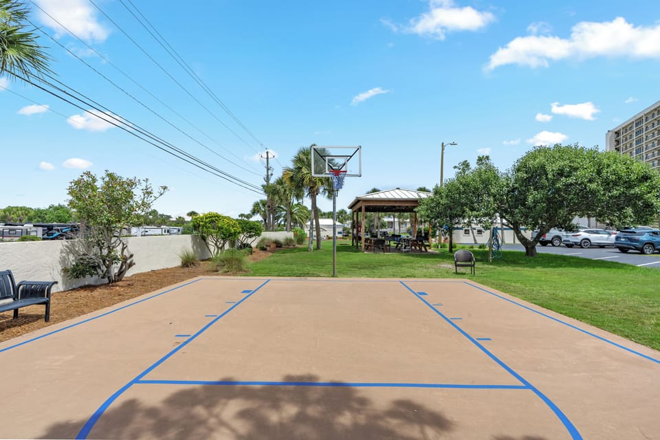 On-site basketball court with nearby picnic pavilion for easy outdoor fun between beach days.