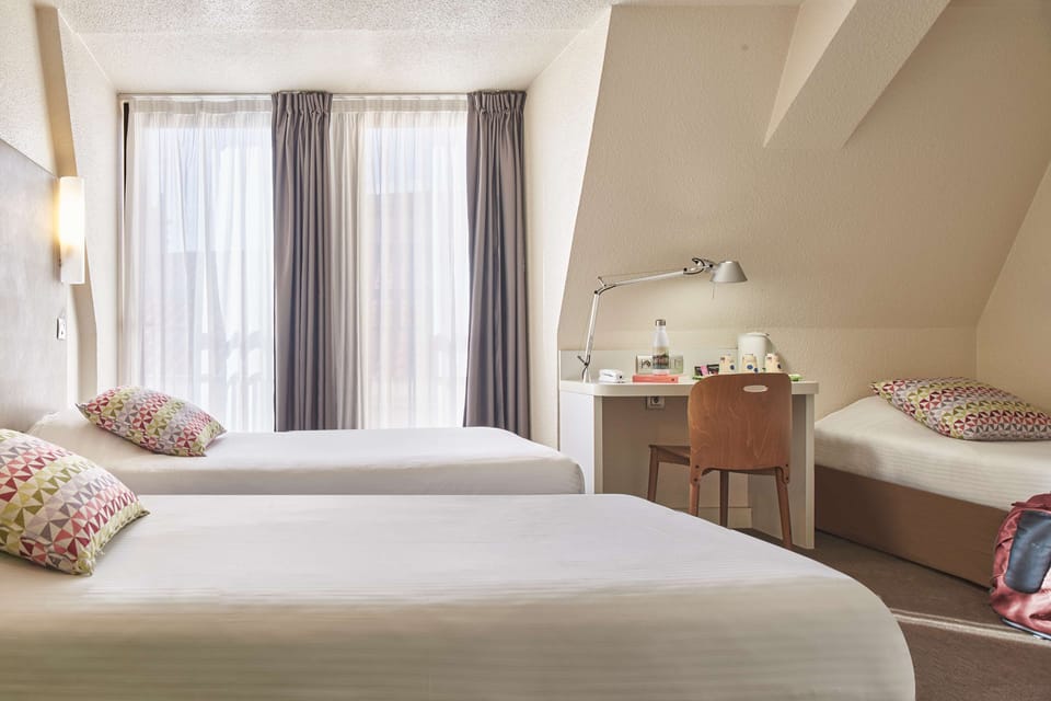 Standard Room, 3 Twin Beds | Premium bedding, desk, blackout drapes, iron/ironing board