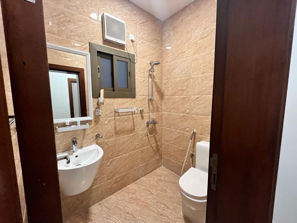 Classic Townhome | Bathroom | Shower, rainfall showerhead, designer toiletries, slippers