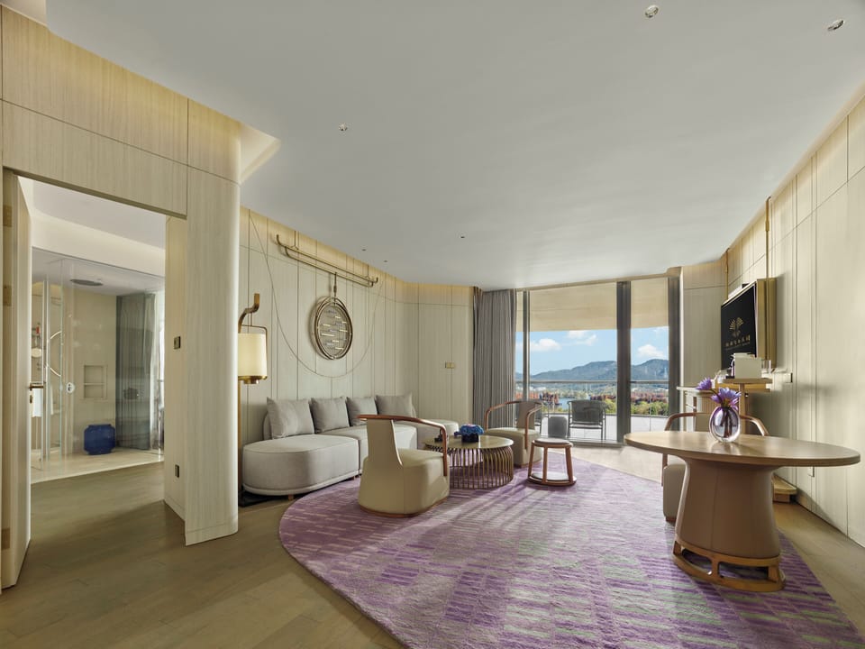 Deluxe Studio Suite, 1 King Bed, Lake View | Minibar, in-room safe, desk, laptop workspace
