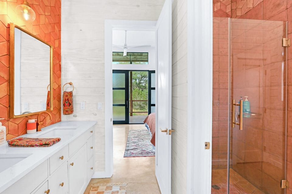 The ensuite has a double vanity