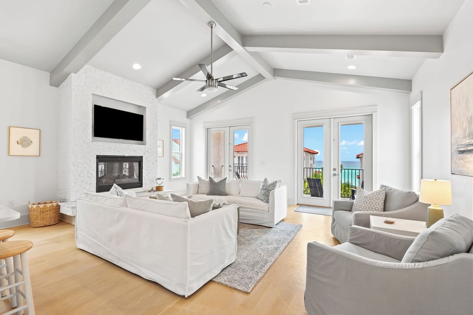 Living room with plenty of seating and wonderful views.