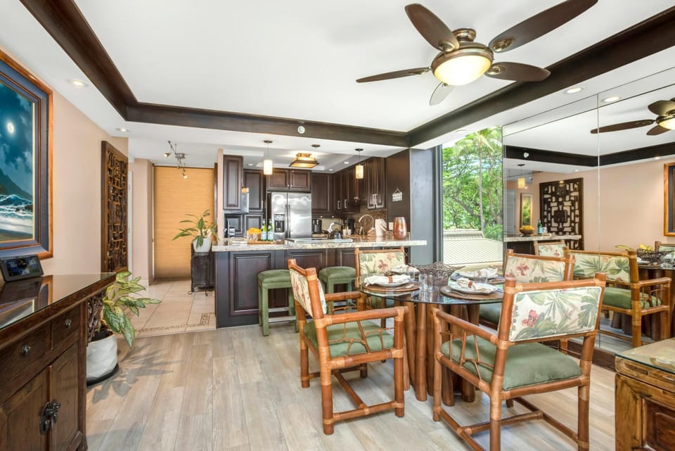 The dining table, a sturdy slice of nature, looks ready to host everything from fresh mango to deep conversation    