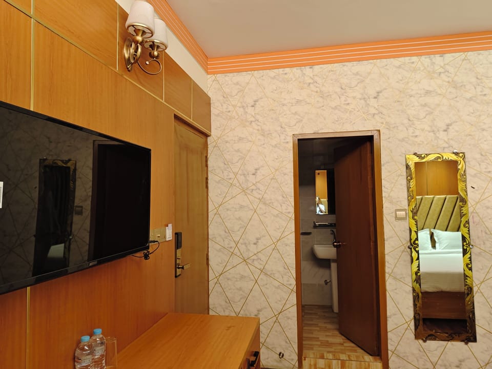 Shower, slippers, towels, soap