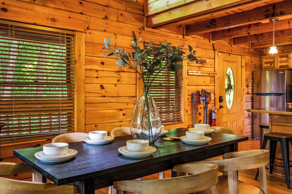 Dine in style at our elegant table, featuring a chic centerpiece and comfortable chairs, perfect for memorable meals.