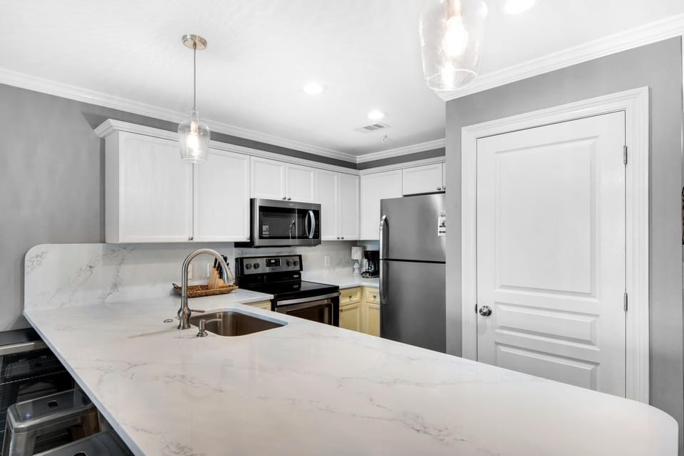 Condo, Multiple Beds (Emerald Dunes 103) | Private kitchen | Oven, toaster