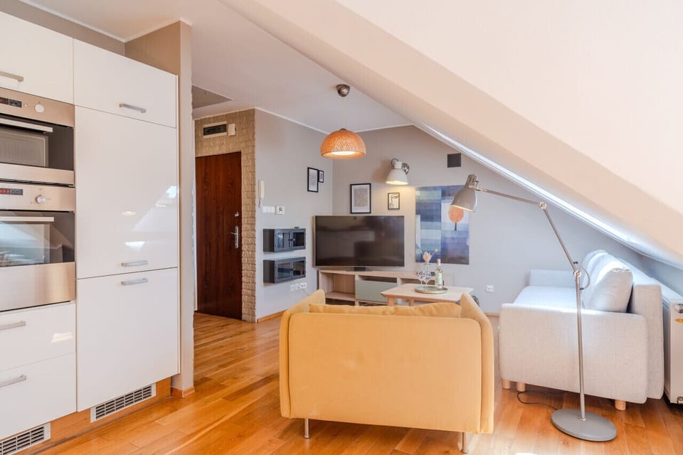Comfortable Living Room with Sofa Bed and Smart TV | Book Now with RENTUJEMY