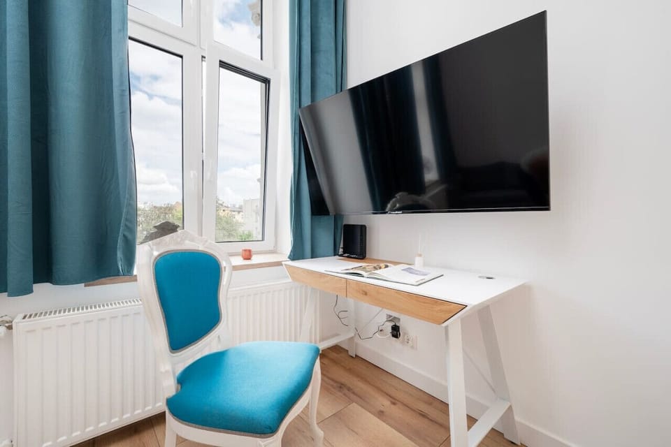Comfortable Living Room with Sofa Bed and Smart TV | Book Now with RENTUJEMY