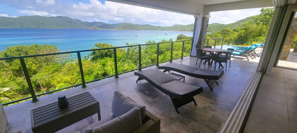 Your patio overlooking the garden path to your very own private beach