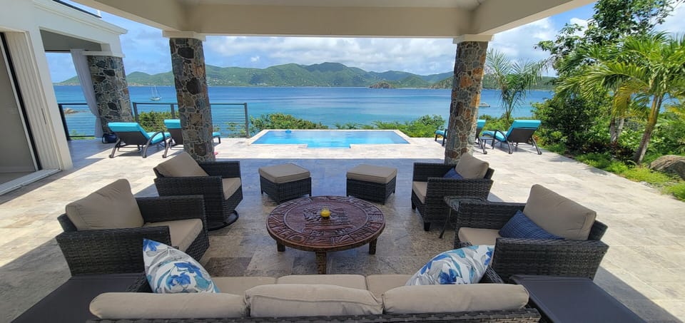 Cabana overlooking the pool and wonderful water views