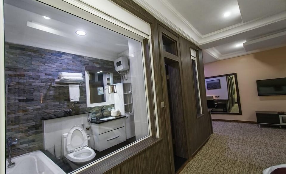 Luxury Room, Balcony, City View | Bathroom | Bathtub, free toiletries, towels, soap