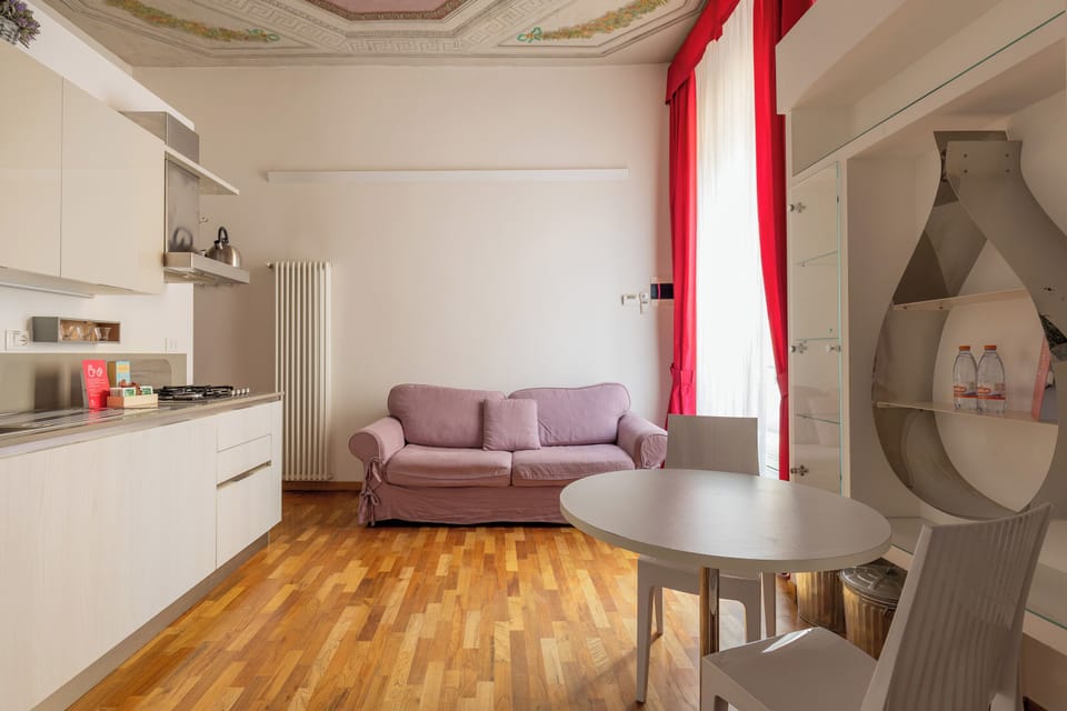 Apartment | Living area | 30-inch flat-screen TV with digital channels