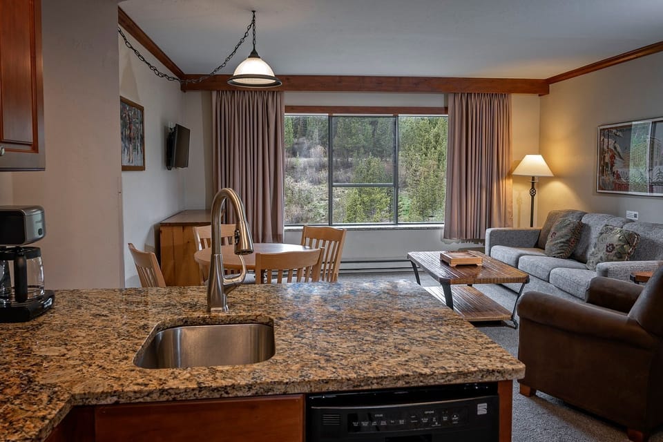 Enjoy meals together in the open dining area with access to fresh mountain air.