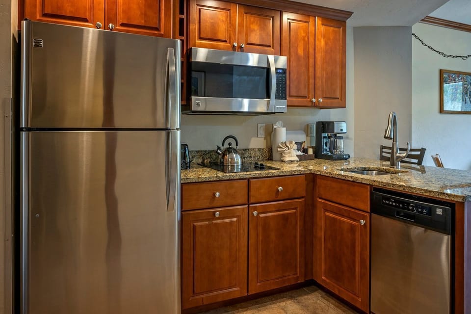 Cook your favorites in the modern kitchen with stainless steel appliances.