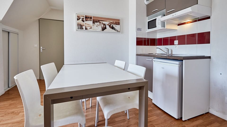 Share meals and laughs at the dining table.
