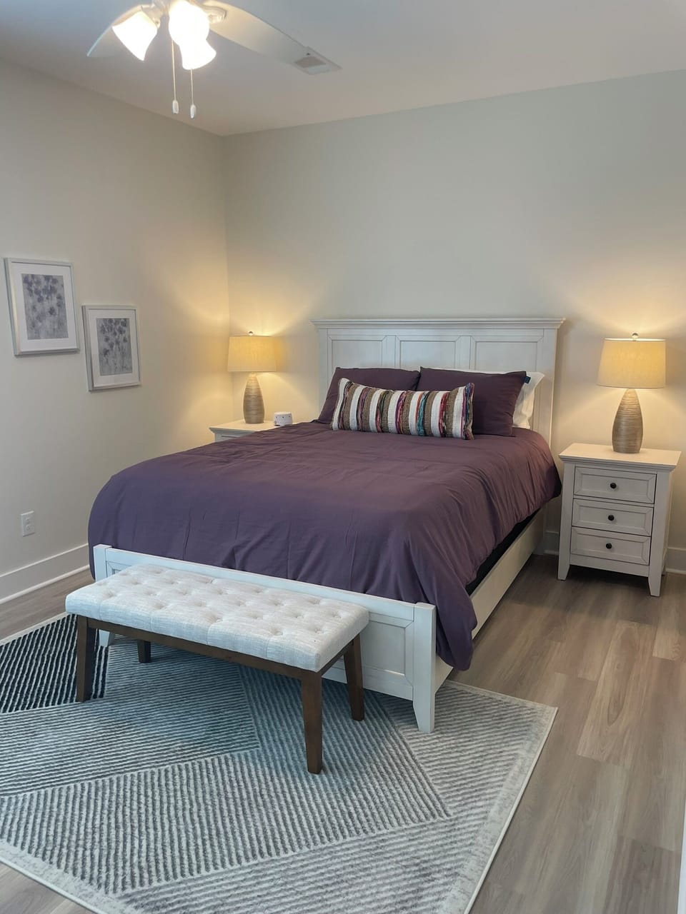 Spacious bedroom with new queen mattress.