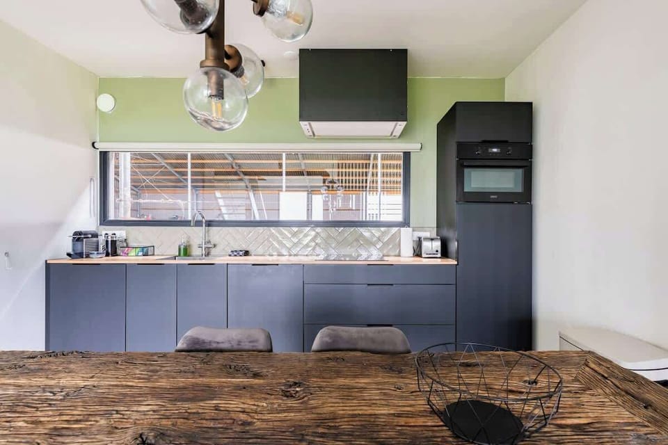 Kitchen with a view of the cowshed.