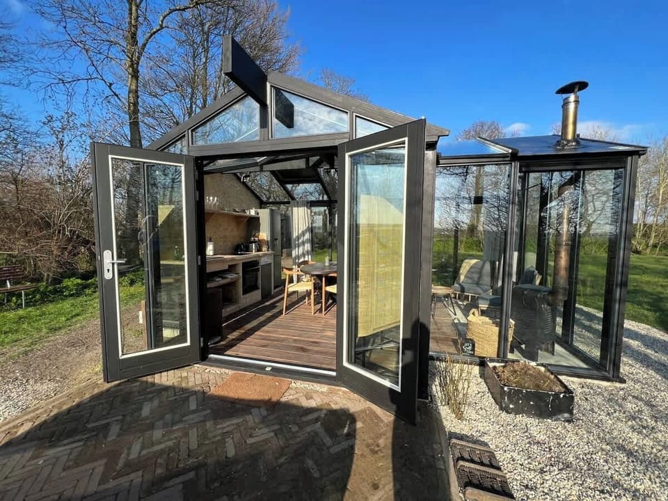 Exterior of the glass cabinet with hinged doors.