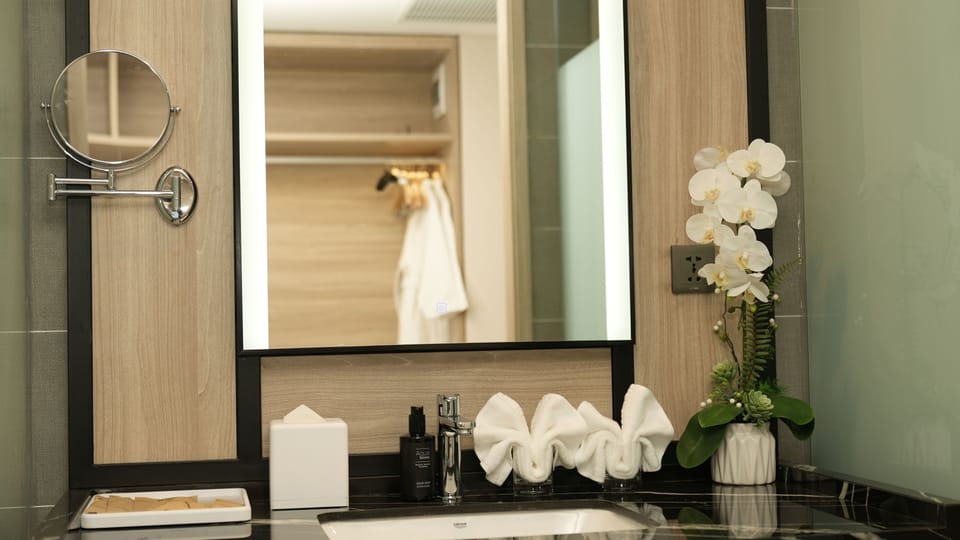 Premier Suite, 1 King Bed, Ocean View | Bathroom | Separate tub and shower, hydromassage showerhead, designer toiletries