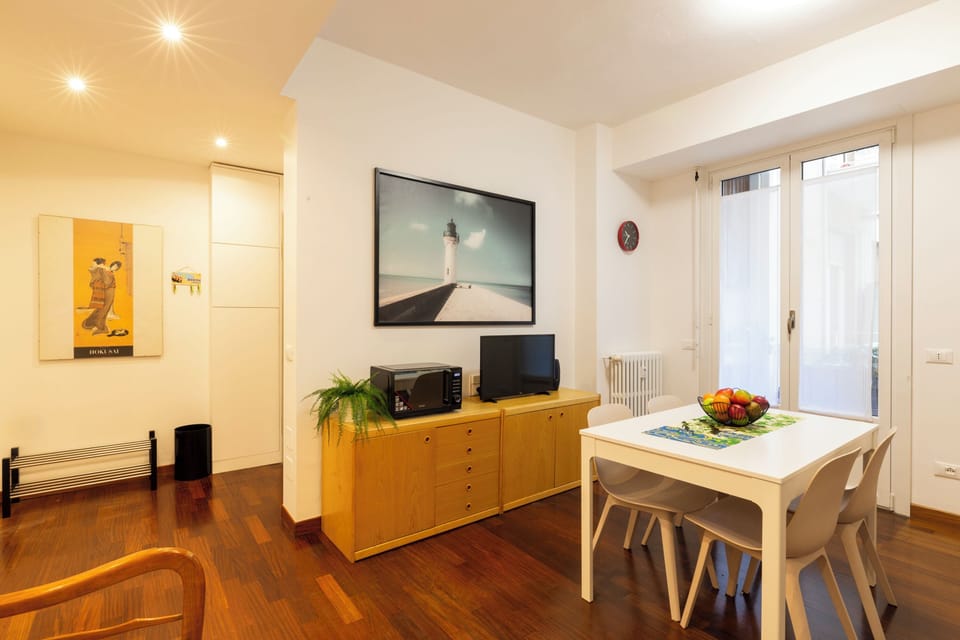 Comfort Apartment | Living area | 32-inch flat-screen TV with digital channels