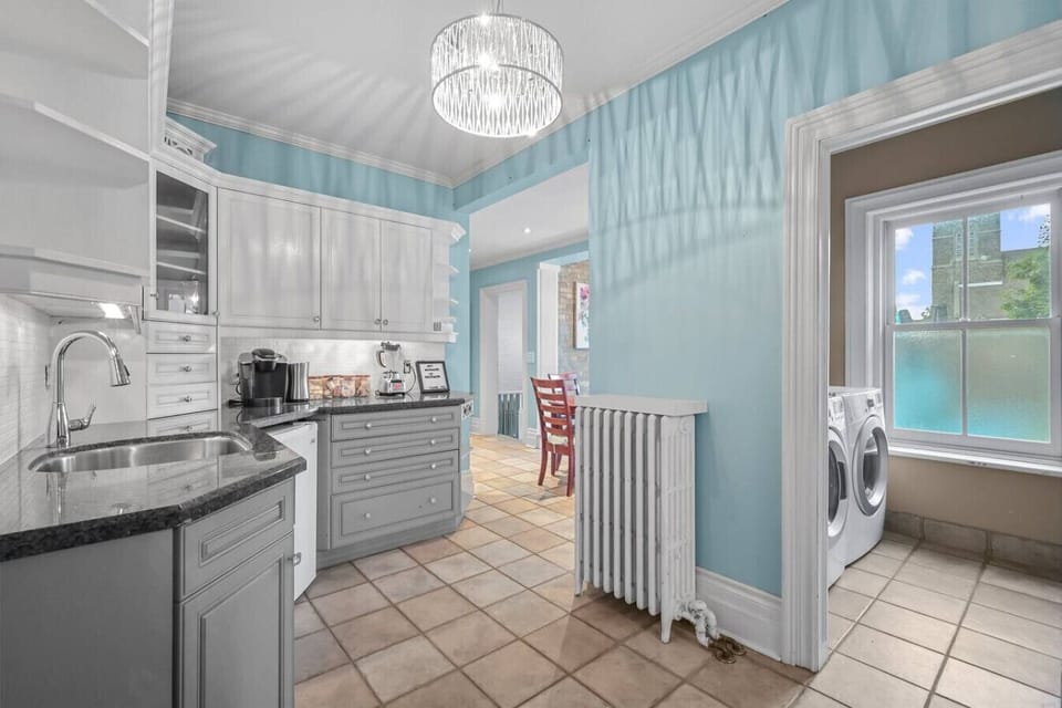 Everything you need is at your fingertips. From the well-equipped kitchen to the in-unit laundry, this space is designed for your convenience. It`s an ideal setup for a carefree and relaxing stay.