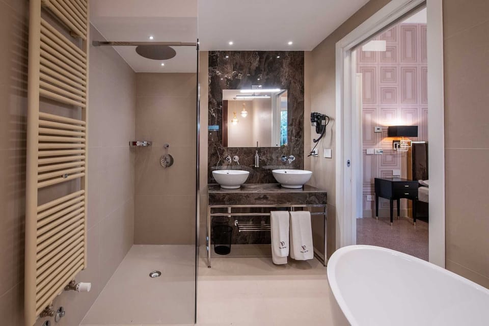 Family Quadruple Room | Bathroom | Hair dryer, bidet, towels, soap