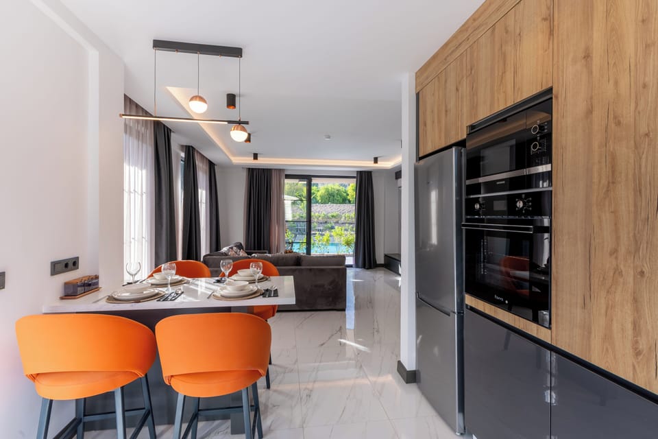 Villa | Private kitchen | Coffee/tea maker, full-size fridge, microwave, oven