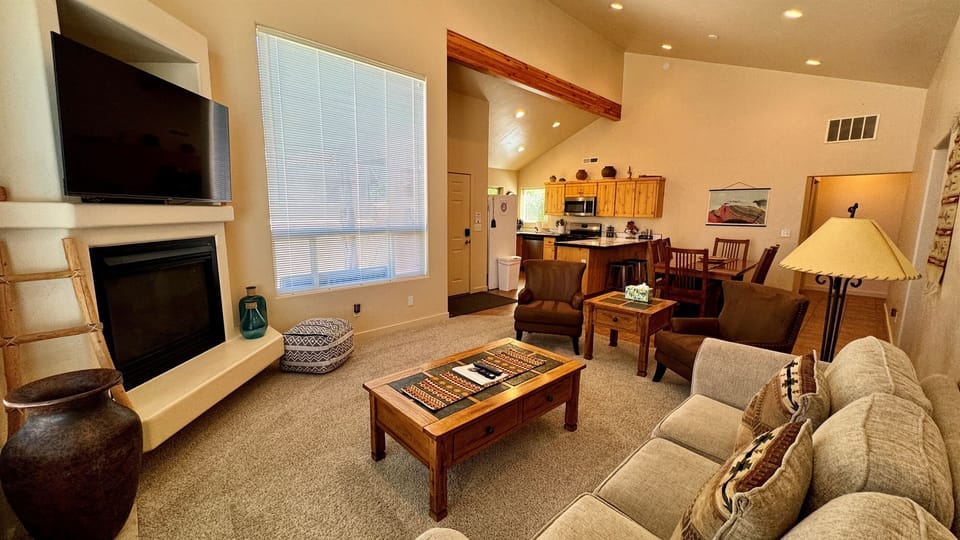 Comfortable Living Room with Smart TV & Fireplace