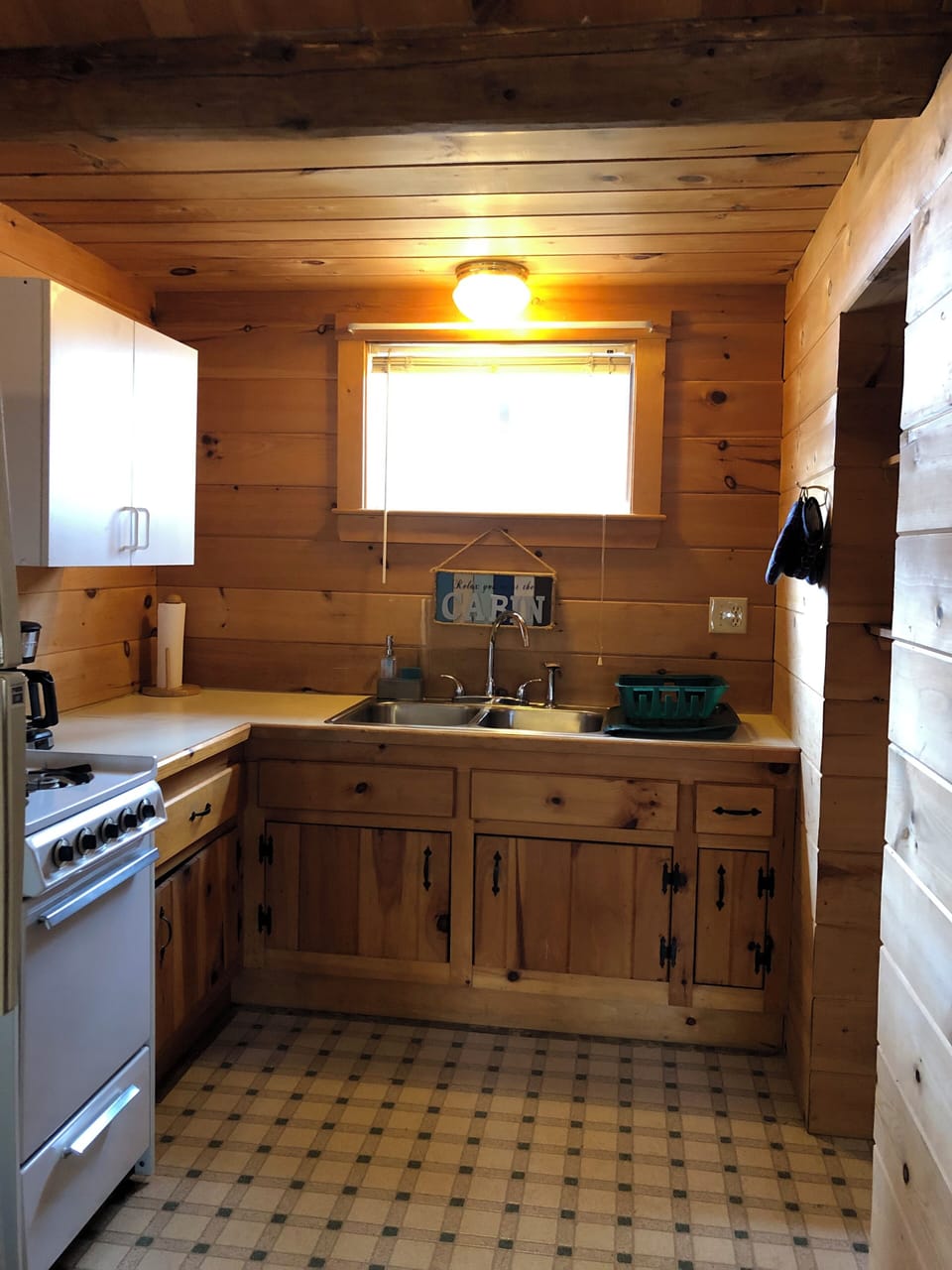 Kitchen with cookware, silverware and dinnerware