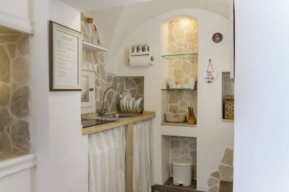 Apartment, Sea View | Private kitchen | Espresso maker, fridge, electric kettle, cookware/dishes/utensils