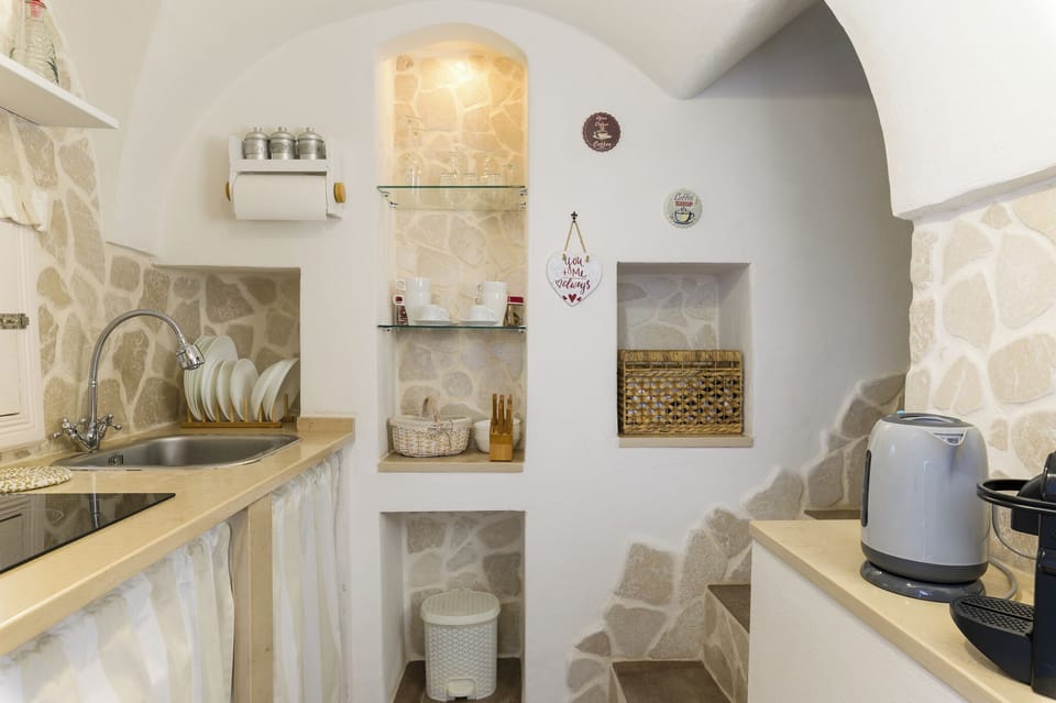 Apartment, Sea View | Private kitchen | Espresso maker, fridge, electric kettle, cookware/dishes/utensils